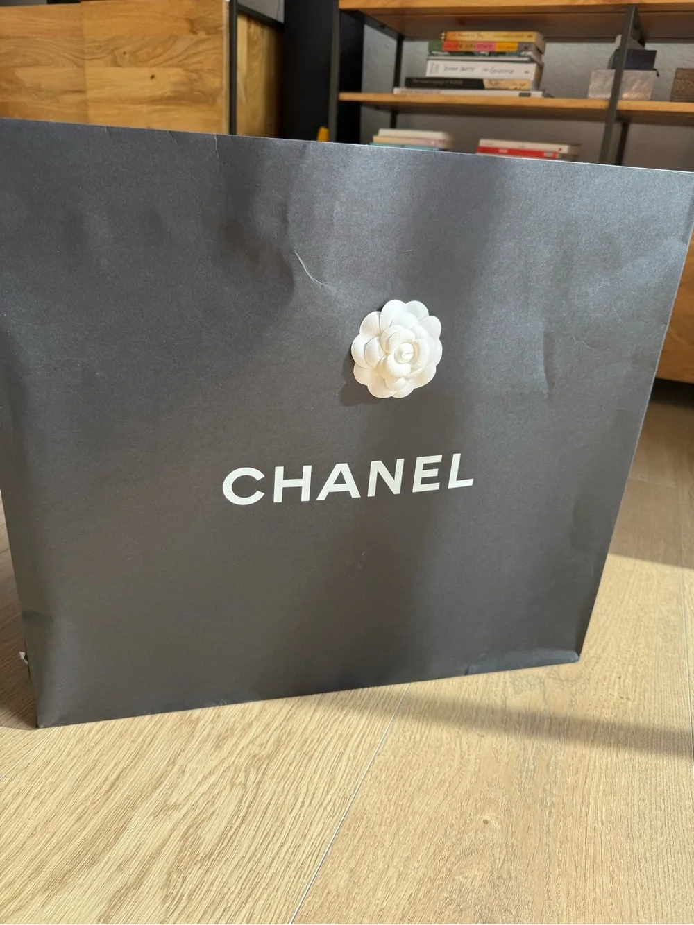 Authentic CHANEL Black and White shopping bag with Camellia Accents